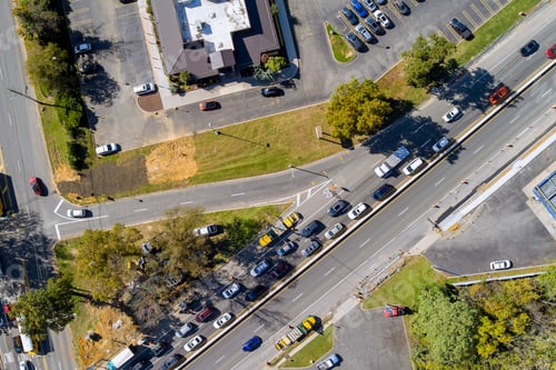 Preview: Aerial view of road intersection urban transportation during rush hour with cars moving