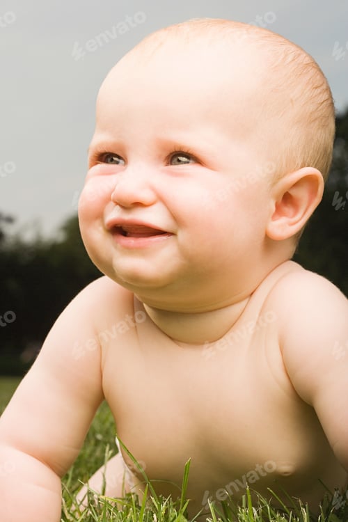 Preview: Baby crawling on grass