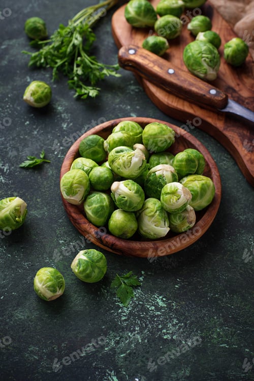 Preview: Brussels sprouts on green concrete background