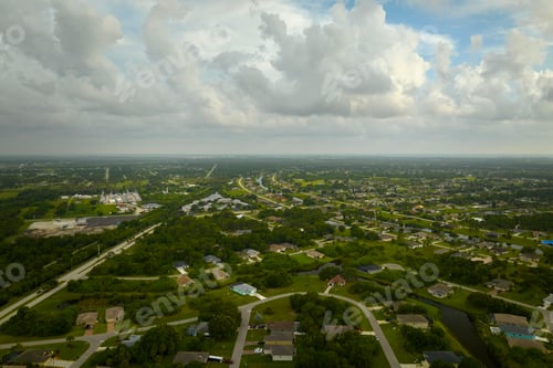 Preview: Aerial view of small town America suburban landscape with private homes