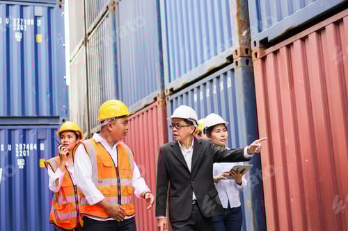 Preview: Group of warehouse worker discussing work at container dock