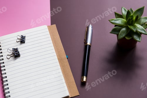 Preview: Notepad, pen and plants office desk, shadow