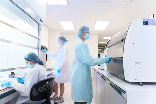 Preview: Laboratory technicians working together on research tasks in a modern facility