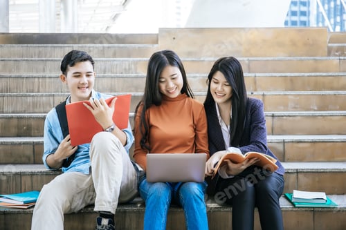 Preview: Group students studying researching on laptop Together sitting at college.