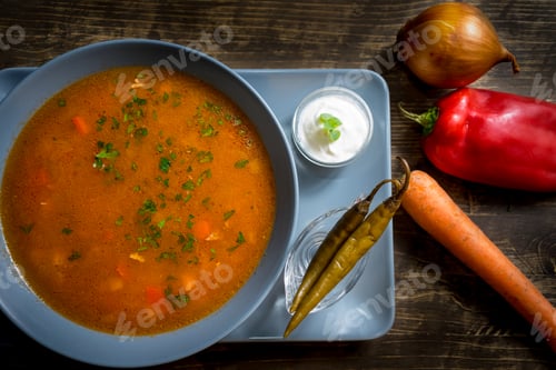 Bowl of Soup with Vegetables and Cream