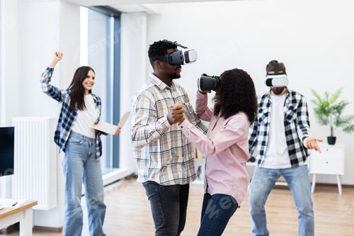 Preview: Group of people enjoying virtual reality with friends in a modern space