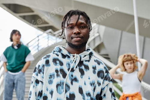 Preview: Diverse group of young people wearing street style clothes outdoors