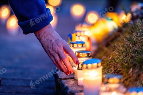 Preview: Candles on streets for peace in Ukraine, symbolising to stop the war, Stand with Ukraine, close-up