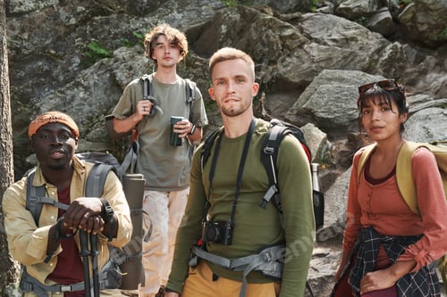 Preview: Group of hikers with bags