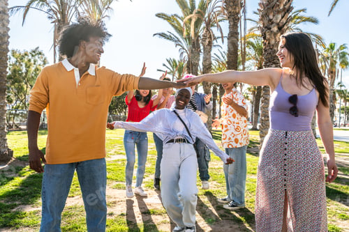 Preview: Multiethnic group of young happy friends hanging out