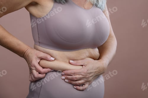 Preview: Close-up of senior woman body, studio shoot.