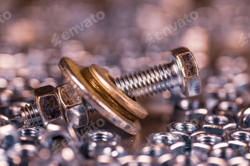 Preview: Metal chrome bolts and nuts in a chaotic order industrial background