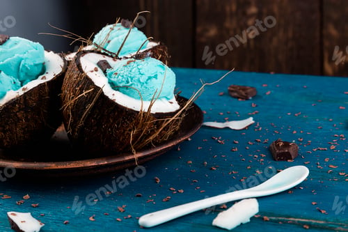 Preview: Blue ice cream in coconut bowl.