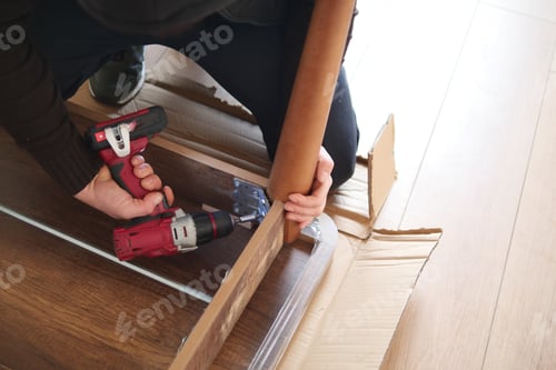 Preview: using electric drilling on wooden board