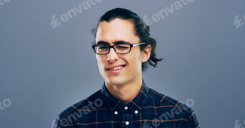 Preview: Wink, glasses and portrait of man in studio for secret, agreement and support gesture. Happiness, f