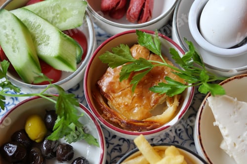 Preview: Delicious assortment of Turkish breakfast dishes on table