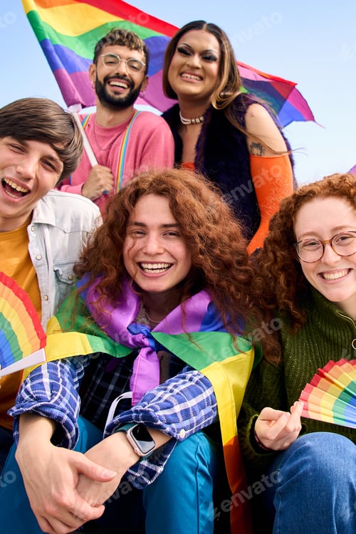 Preview: Portrait group diverse people smiling for gay pride day photo. Young friends gathered celebrating.