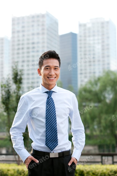 Preview: Confident Businessman Standing Outdoors