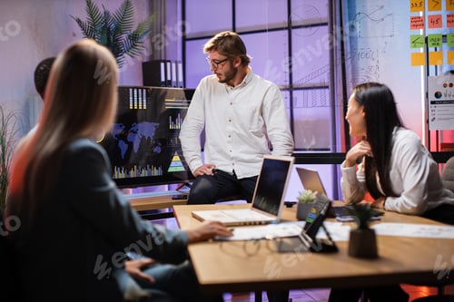Preview: Multicultural business analytics having meeting at office