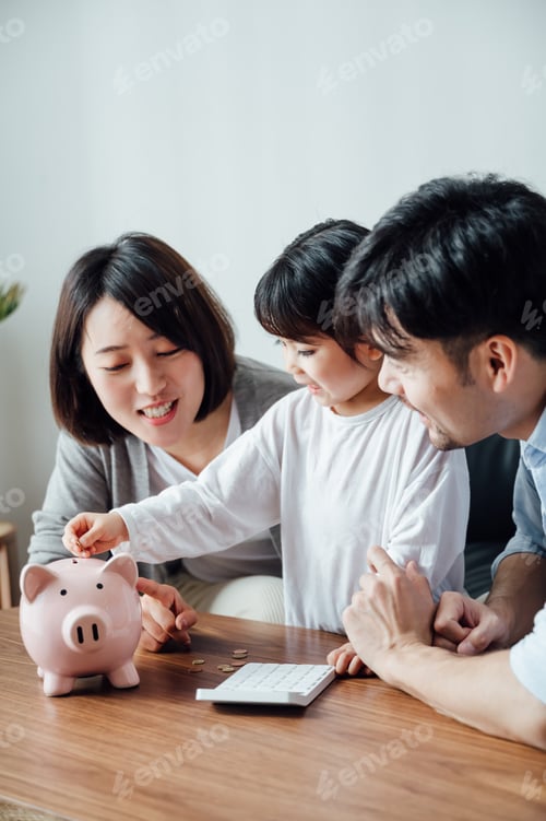 Preview: Family Saving Money Together with Pink Piggy Bank