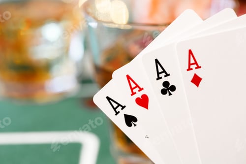 Preview: Playing cards on poker table background close up