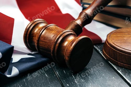 Preview: Judge gavel on the background of the flag united states of America