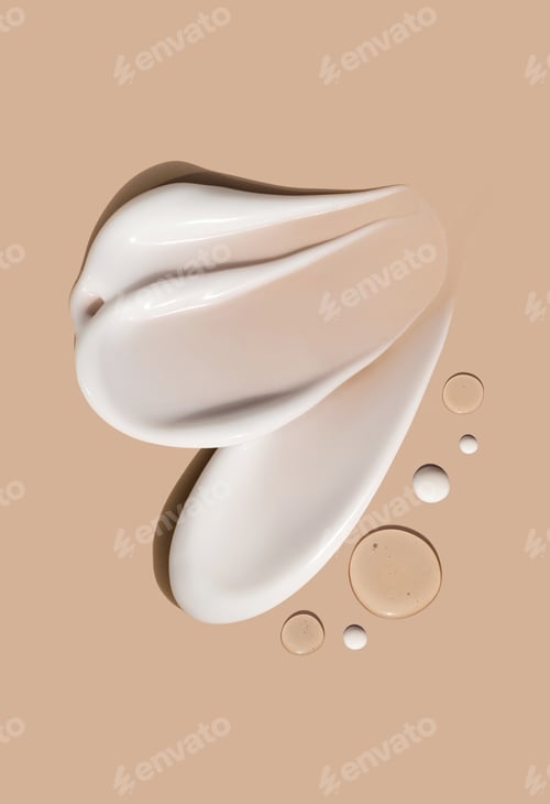 Preview: creamy texture of cosmetic samples on a pastel beige background