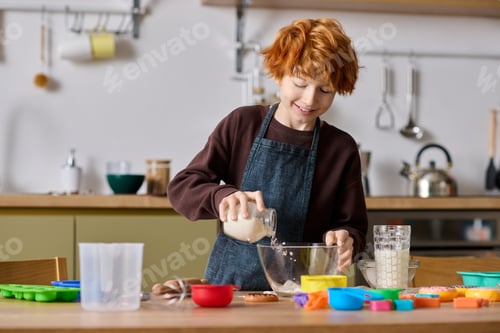 Preview: Little boy joyfully baking with fresh ingredients in a cozy kitchen setting