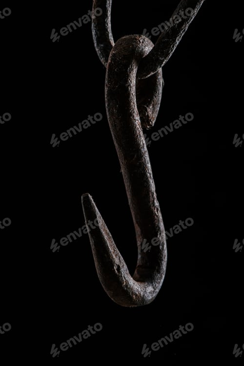 Preview: close up view of vintage rusty hook isolated on black