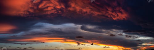 Preview: Dramatic Panoramic View of a cloudscape during a dark and colorful sunset