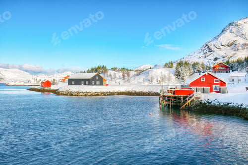 Preview: Traditional Norwegian red wooden houses on the shore of Sundstraumen strait