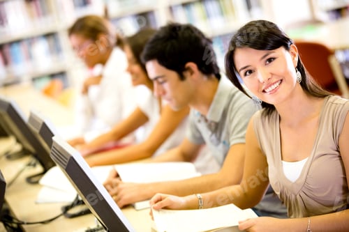 Preview: Group Of People Researching At The Library On Computers