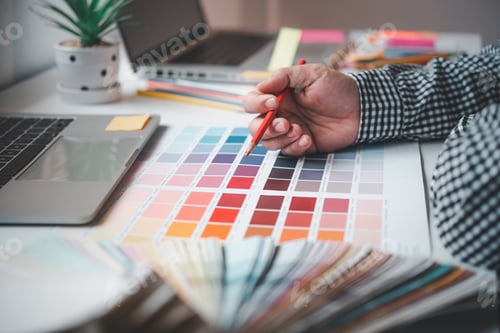 Preview: The graphic designer creative team is currently working on the design and color selection