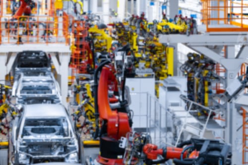 Preview: vague premise of Assembly line production of cars. Defocused image of car factory