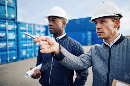 Preview: Engineers tracking shipping inventory in a freight container yard