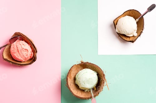 Preview: Coconut shells with fresh natural colorful ice-cream on a duotone pastel background with paper sheet
