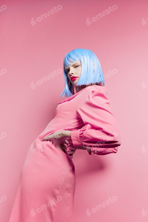 Preview: glamorous woman in blue wig pink dress red lips studio model