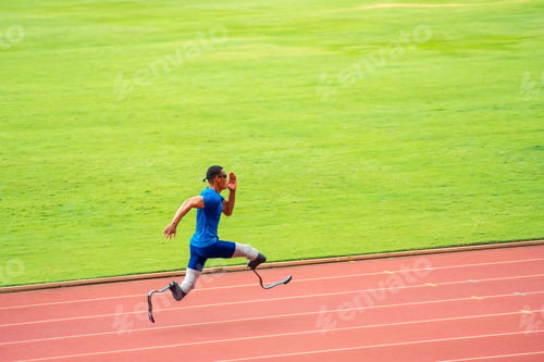 Preview: Asian para-athletes disabled with prosthetic blades running at stadium.