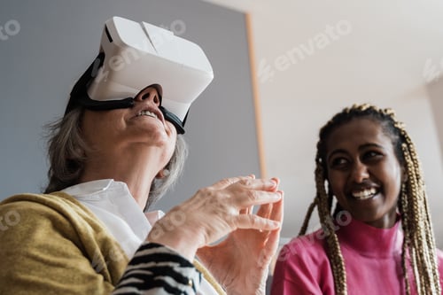 Preview: Senior Woman Experiences Virtual Reality with Friend