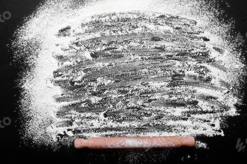 Preview: Pasta or bread cooking ingredients on black kitchen table. Top view with space for your text