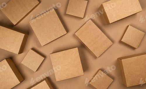 Preview: Brown cardboard boxes on craft paper background, top view
