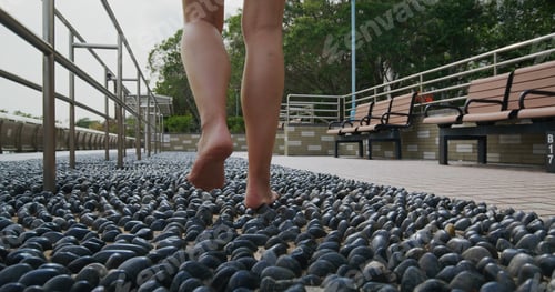 Preview: Woman walk on stone path