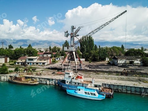 Preview: Abandoned port with rusted quay cranes
