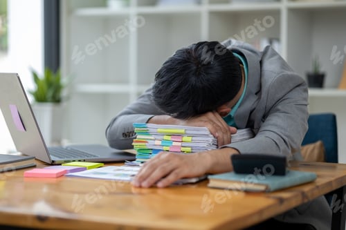 Preview: Startup businessman working and having body aches due to hard work, office syndrome, company executi