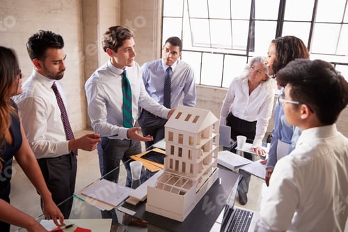 Preview: Architect presenting a design model to business colleagues