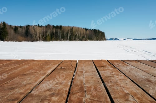 Preview: Majestic winter landscape glowing by sunlight in the morning. Copy space on woden background.