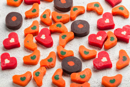 Preview: close-up image, colorful dog treats, on concrete