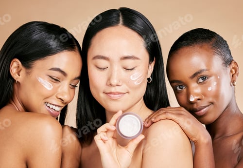 Preview: Face, cream and product by women in studio for skincare, wellness and grooming on a brown backgroun