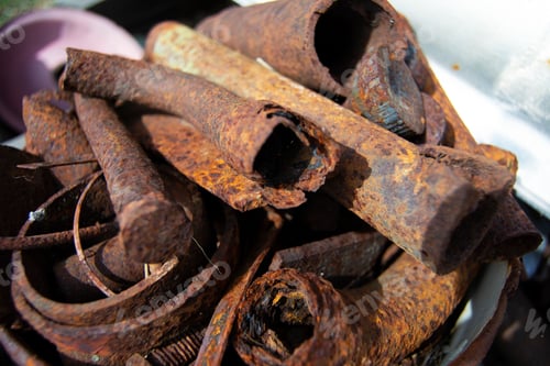Preview: Metal rods. Scrap metal. Photo metal surfaces with rust. Diverse old rusty scrap metal