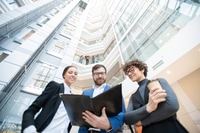 Preview: Reading business papers in office